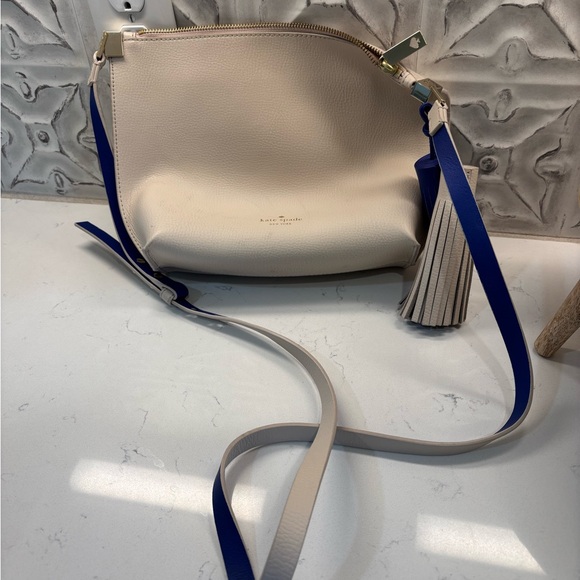 kate spade Handbags - Kate Spade Cream and Blue Crossbody Bag with Tassel